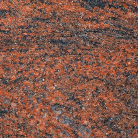 Ingrandimento che evidenzia la struttura di una lastra di granito Multicolor Rosso